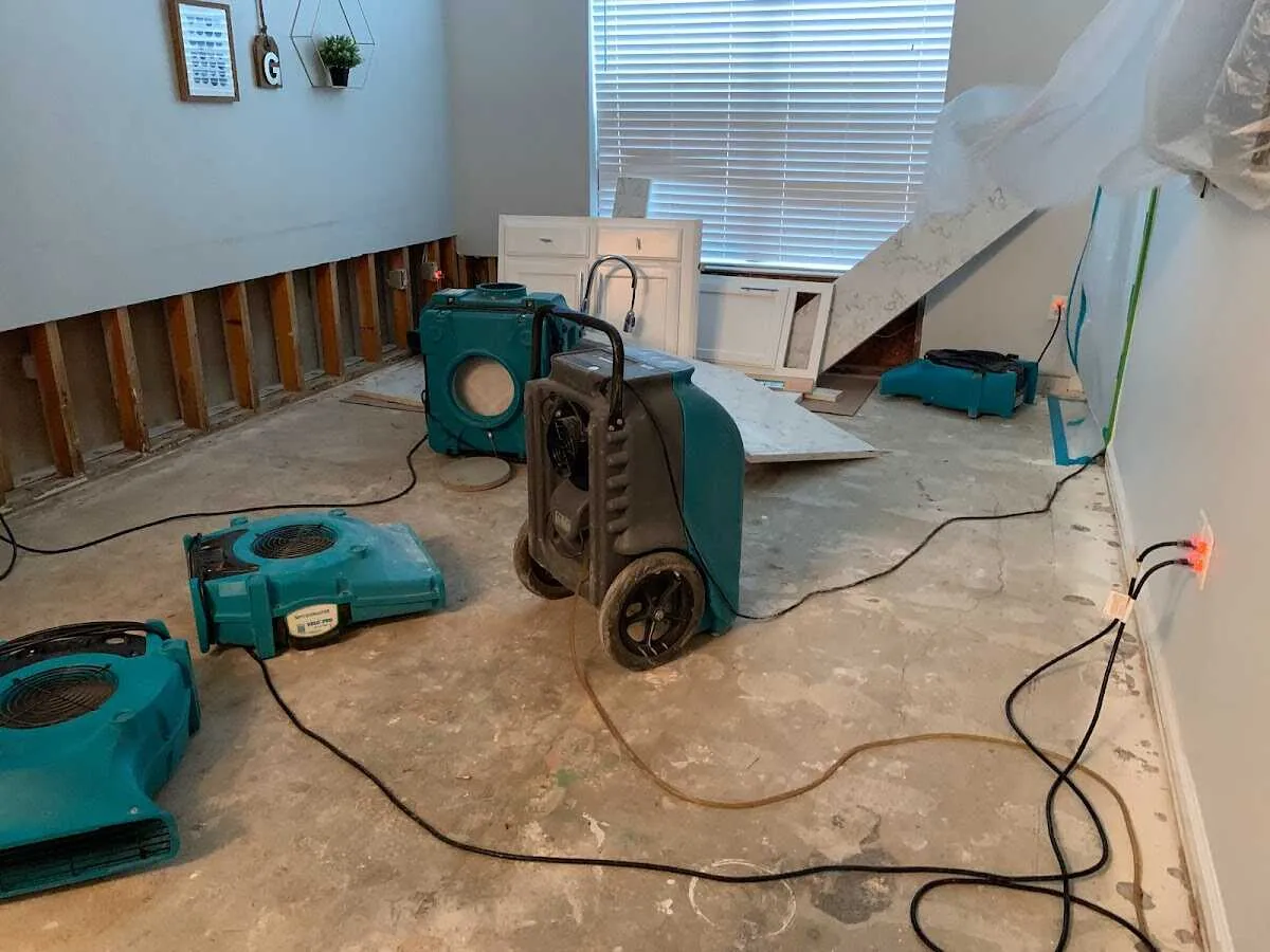 Dehumidifier in flood-cut room for Water Damage Restoration in Plains